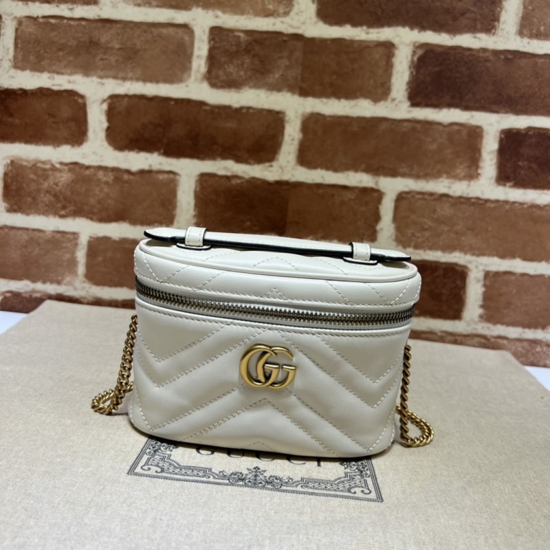 G*u*i cosmetic bags